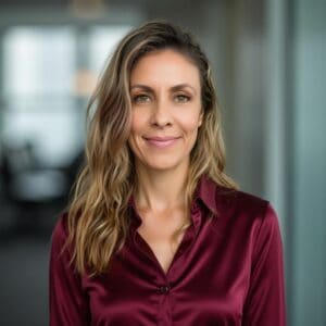 1. Professional woman smiling in business attire, representing reliable home loan assistance and personalized mortgage solutions from Future Home Loans.